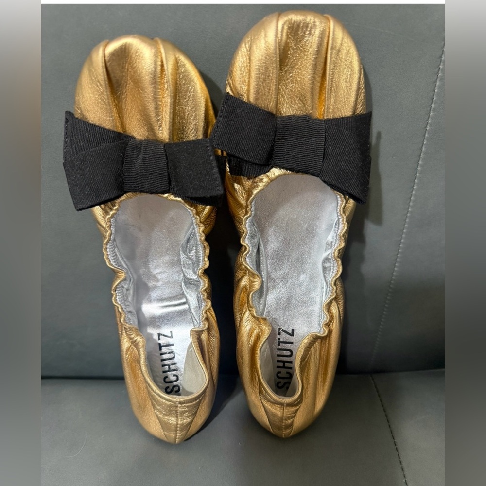 SCHUTZ Ballet Gold Flats with Black Bow